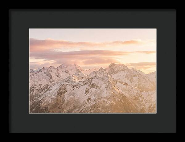 Sunrise Over Snowy Peaks