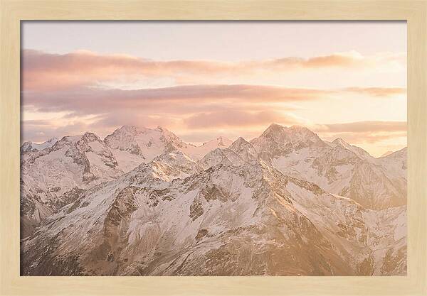 Sunrise Over Snowy Peaks