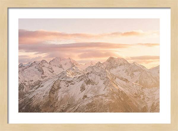 Sunrise Over Snowy Peaks