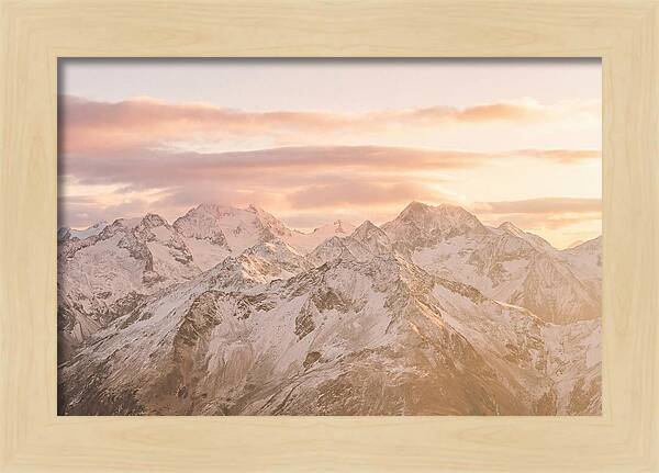 Sunrise Over Snowy Peaks