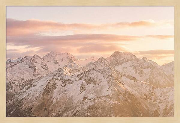 Sunrise Over Snowy Peaks
