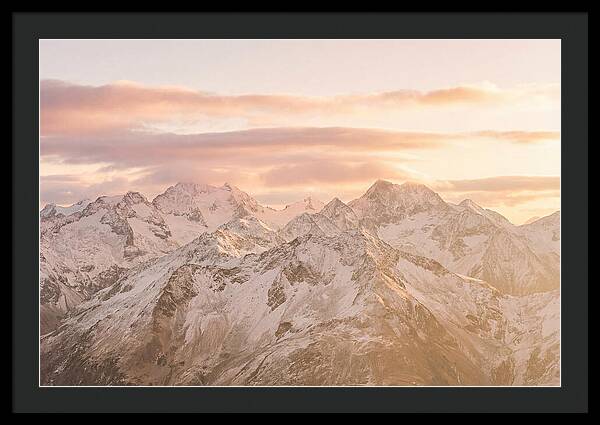 Sunrise Over Snowy Peaks