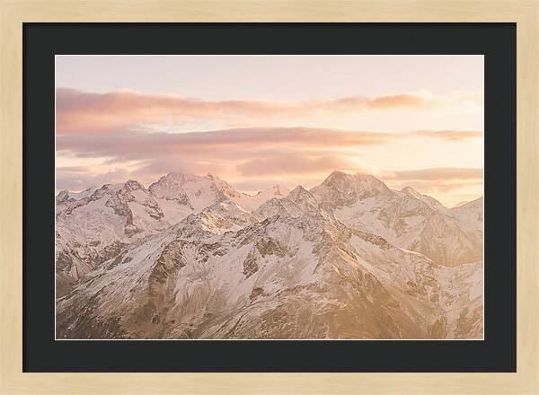 Sunrise Over Snowy Peaks