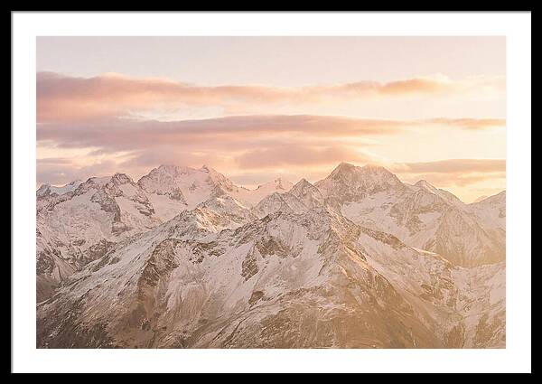 Sunrise Over Snowy Peaks