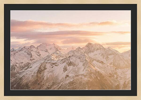 Sunrise Over Snowy Peaks