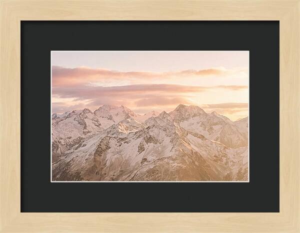 Sunrise Over Snowy Peaks