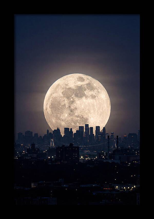 Supermoon Over City Skyline