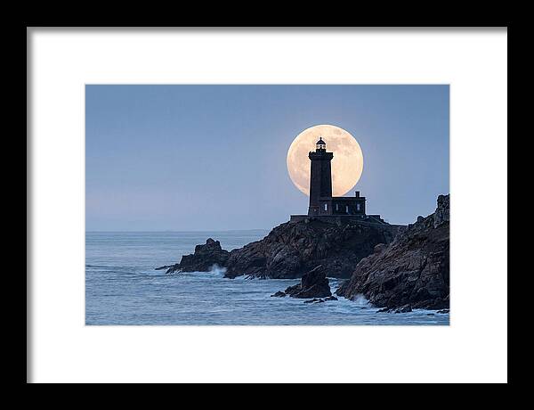 Supermoon Rising Behind Lighthouse
