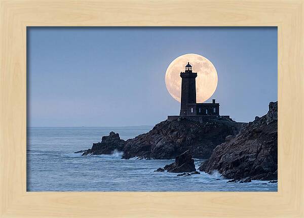 Supermoon Rising Behind Lighthouse