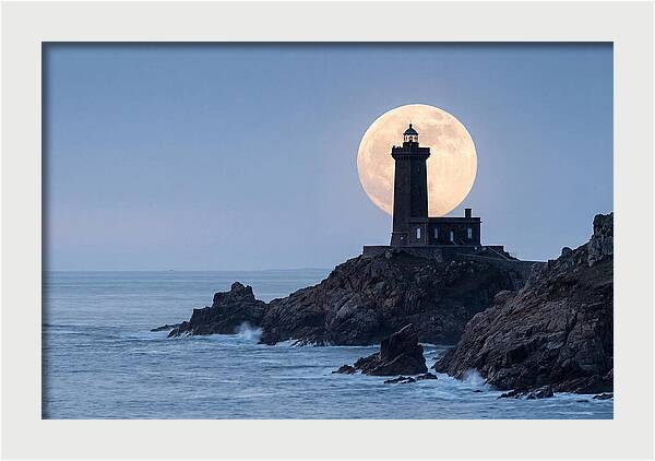 Supermoon Rising Behind Lighthouse