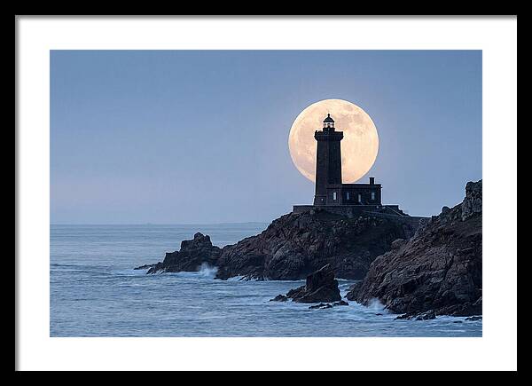 Supermoon Rising Behind Lighthouse