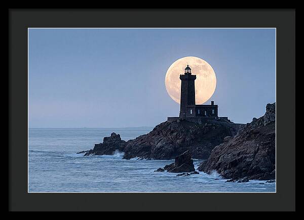 Supermoon Rising Behind Lighthouse