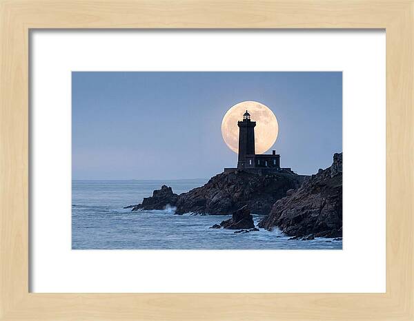 Supermoon Rising Behind Lighthouse