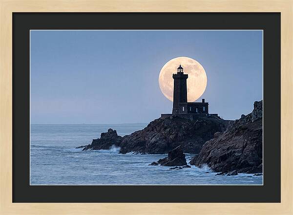 Supermoon Rising Behind Lighthouse