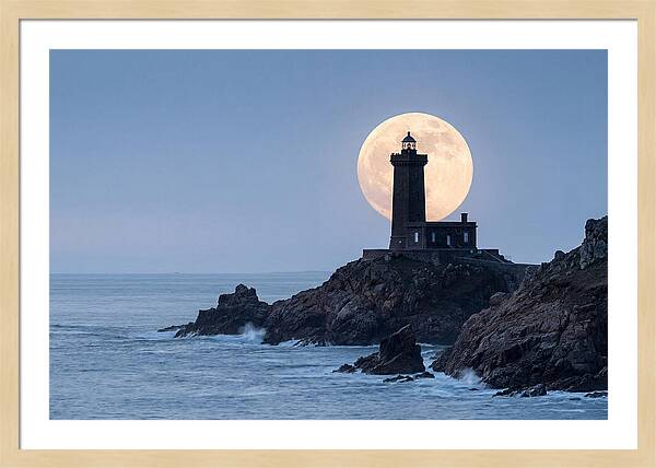 Supermoon Rising Behind Lighthouse