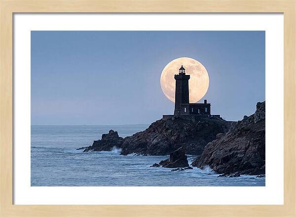 Supermoon Rising Behind Lighthouse