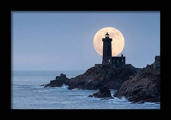 Supermoon Rising Behind Lighthouse