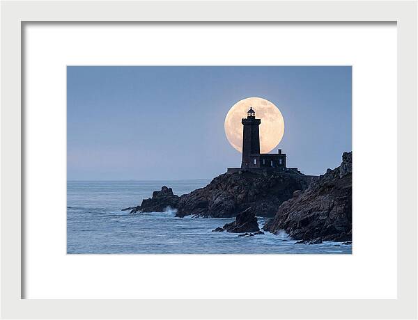 Supermoon Rising Behind Lighthouse