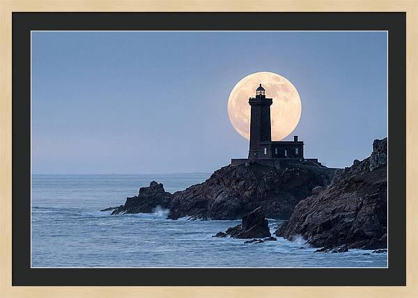 Supermoon Rising Behind Lighthouse