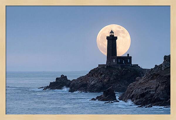 Supermoon Rising Behind Lighthouse