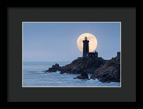 Supermoon Rising Behind Lighthouse