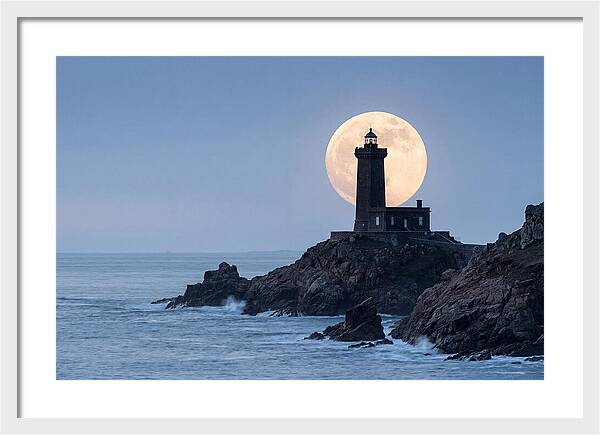 Supermoon Rising Behind Lighthouse