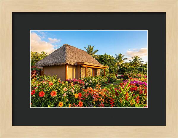 Thatched Roof Cottage Surrounded By Blooms