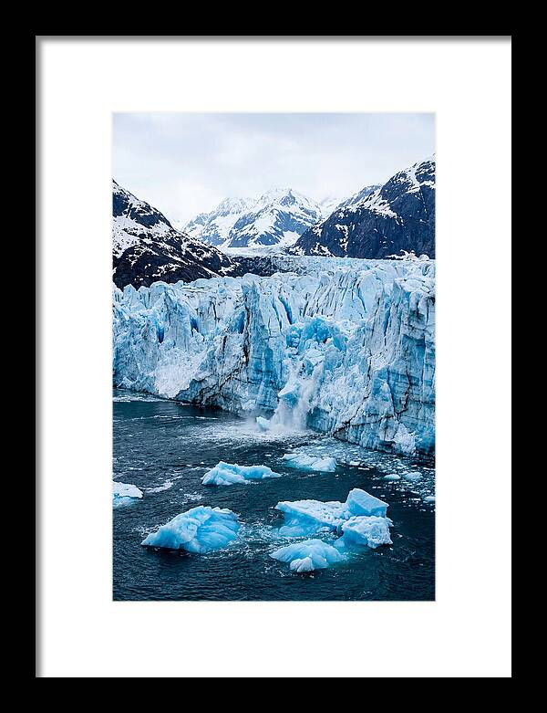 Tidewater Glacier Calving Into Fjord