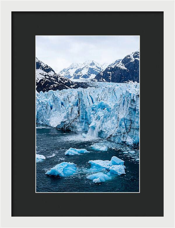 Tidewater Glacier Calving Into Fjord