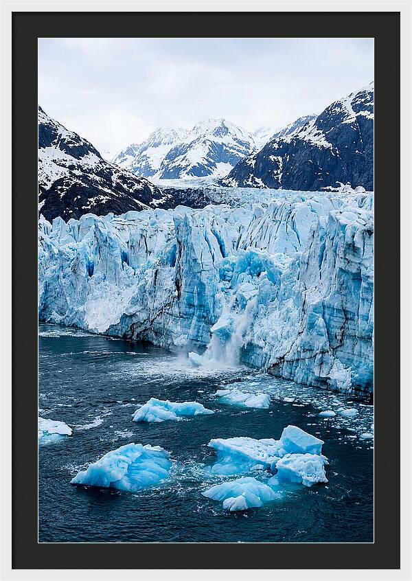 Tidewater Glacier Calving Into Fjord