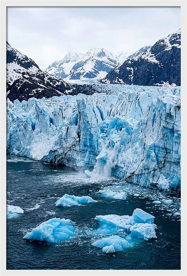 Tidewater Glacier Calving Into Fjord