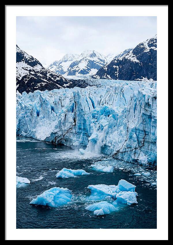 Tidewater Glacier Calving Into Fjord