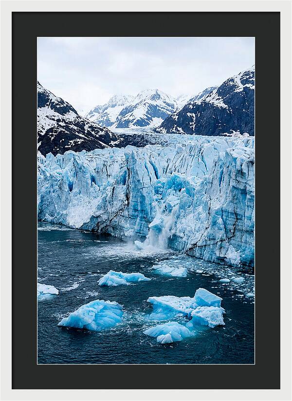 Tidewater Glacier Calving Into Fjord