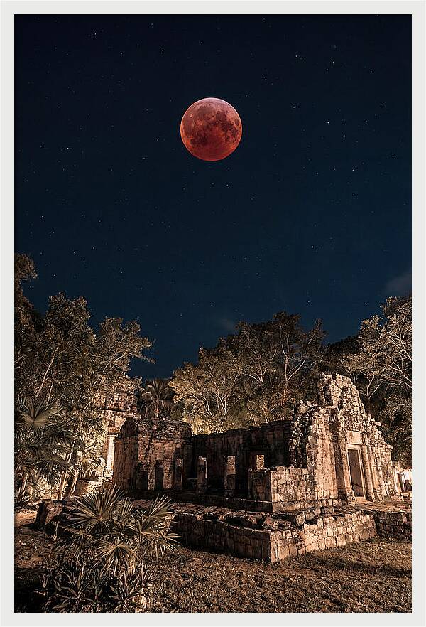 Total Lunar Eclipse Over Ancient Ruins