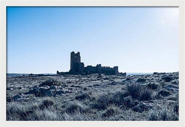 Tower Ruins Silhouetted Against Horizon