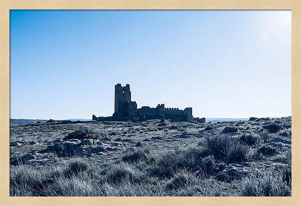 Tower Ruins Silhouetted Against Horizon