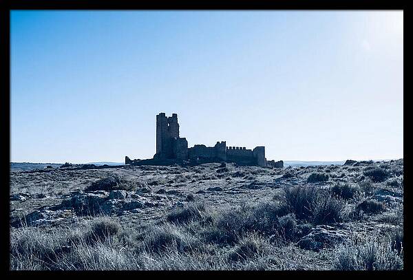 Tower Ruins Silhouetted Against Horizon