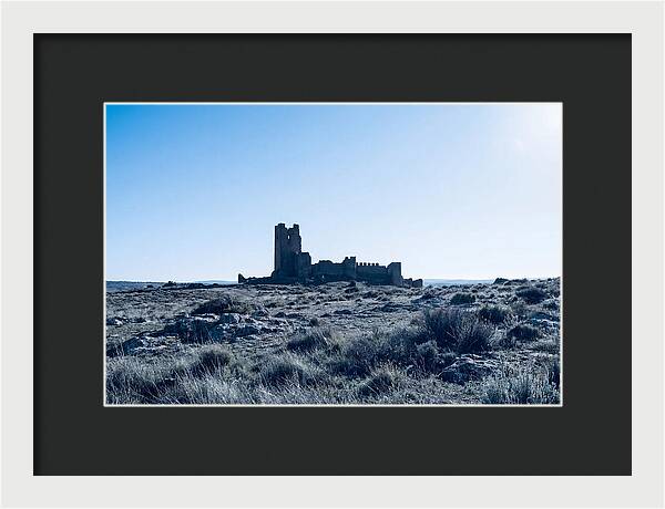 Tower Ruins Silhouetted Against Horizon
