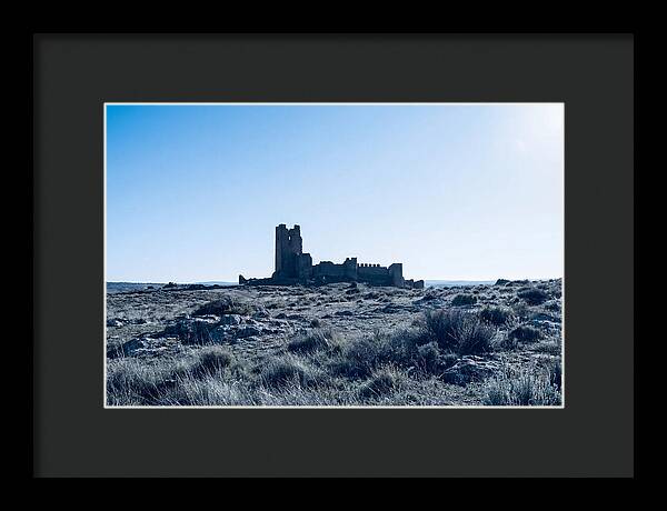 Tower Ruins Silhouetted Against Horizon
