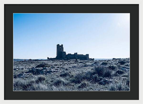 Tower Ruins Silhouetted Against Horizon