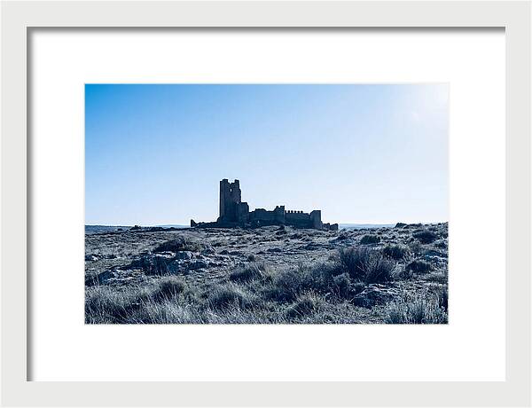 Tower Ruins Silhouetted Against Horizon