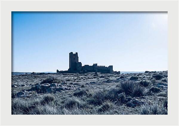 Tower Ruins Silhouetted Against Horizon
