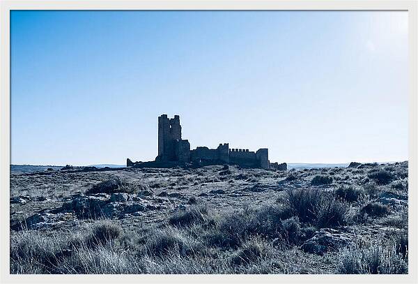 Tower Ruins Silhouetted Against Horizon