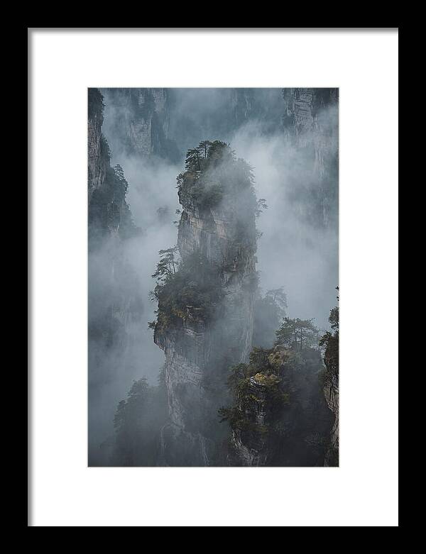 Towering Quartzite Pillars In Fog