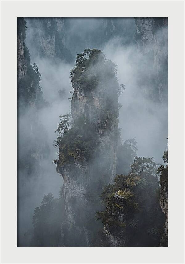 Towering Quartzite Pillars In Fog