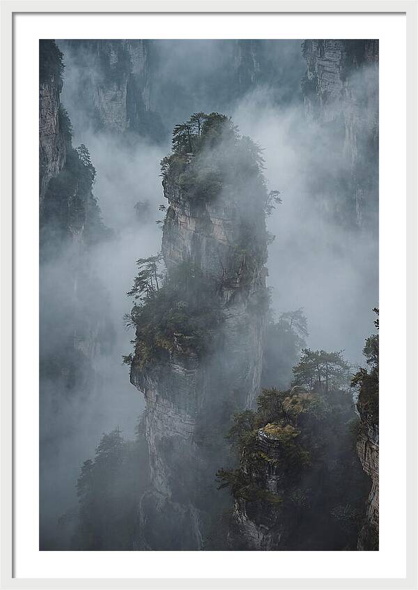 Towering Quartzite Pillars In Fog