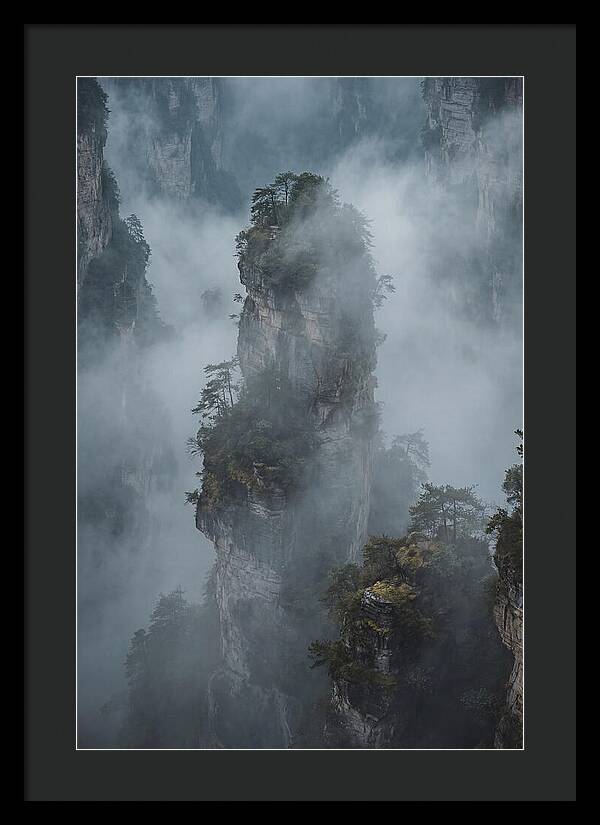 Towering Quartzite Pillars In Fog