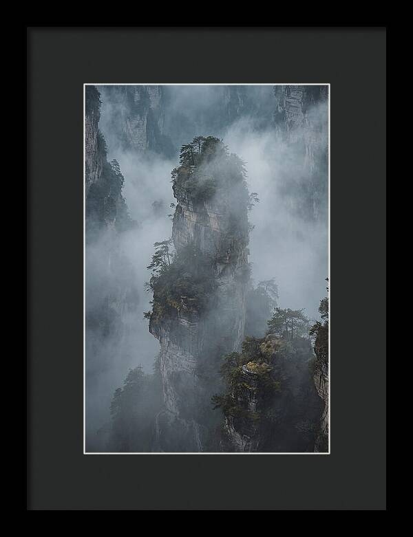 Towering Quartzite Pillars In Fog