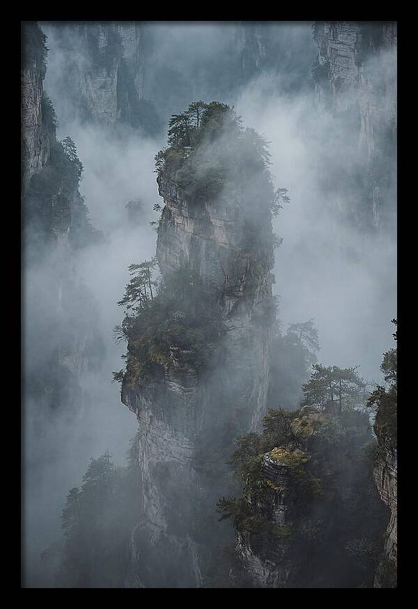 Towering Quartzite Pillars In Fog