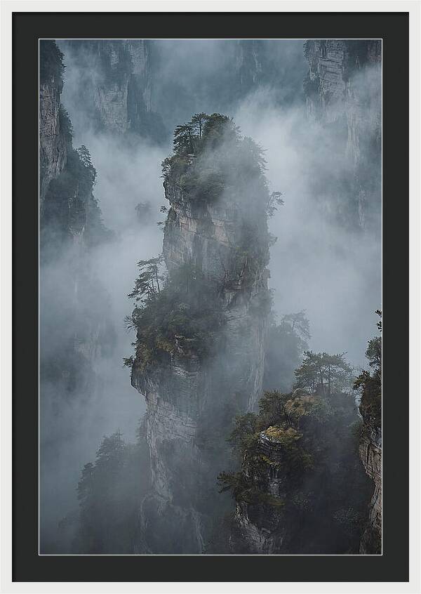 Towering Quartzite Pillars In Fog